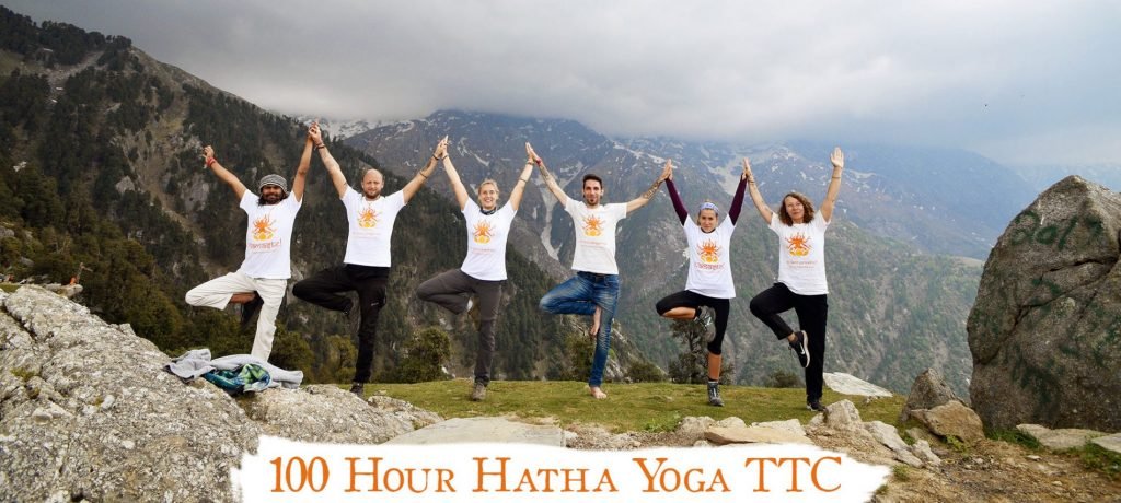 happy students in the 100 hour yoga yttc in rishikesh at shree hari yoga school in india