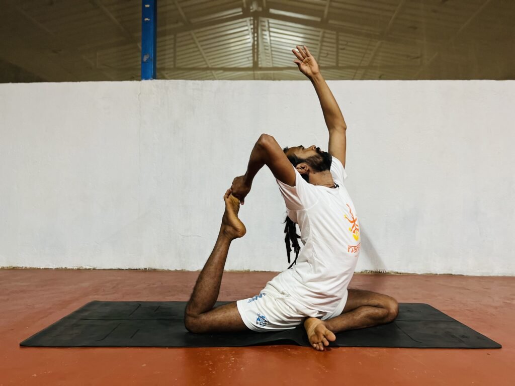 Ek pada rajkapotasana International Toga day